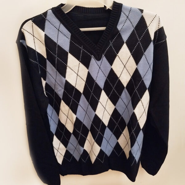 Suéter masculino azul de tricô, com o padrão escocês Argyle. Confeccionado em lã. Produto da Loja de Inverno.